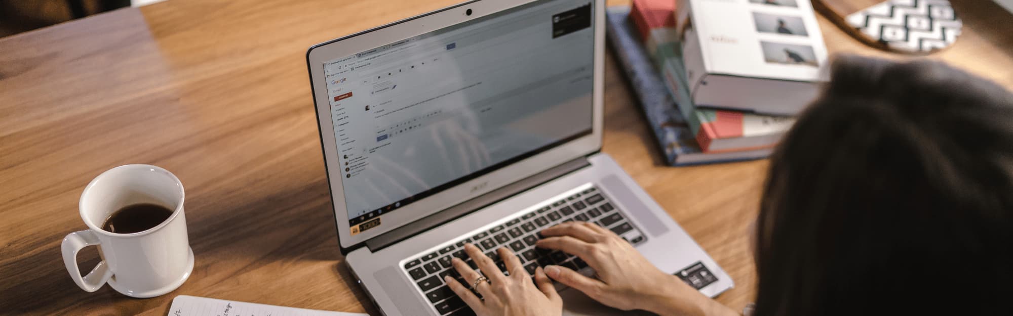 computer and coffee mug